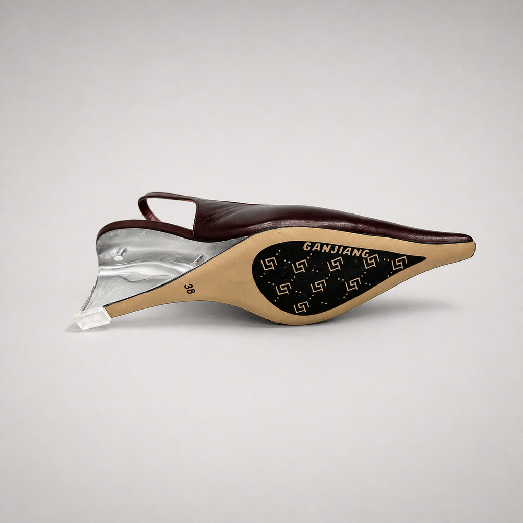 Burgundy wedge slingback pump outsole view showing the cow leather outsole