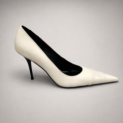 White pump side profile showing a pointed toe