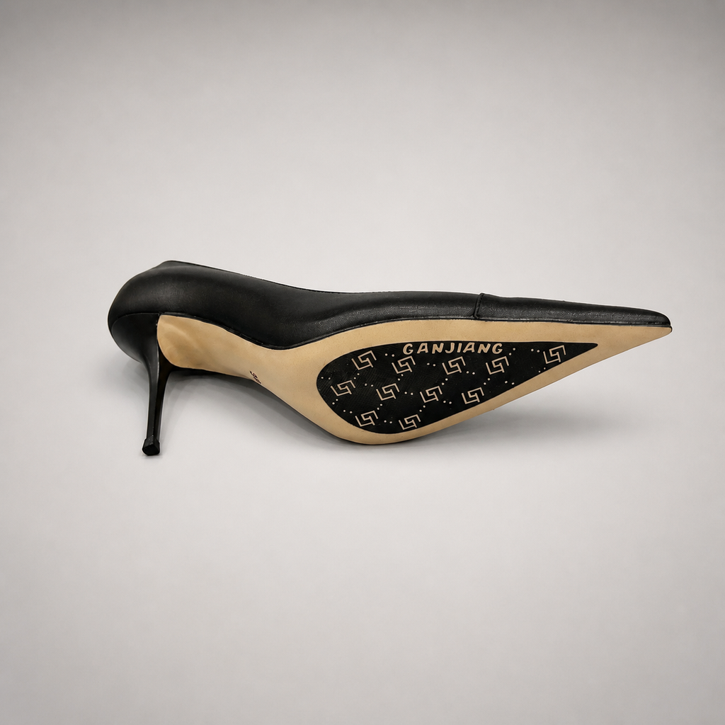 Black pump outsole view showing the cow leather outsole