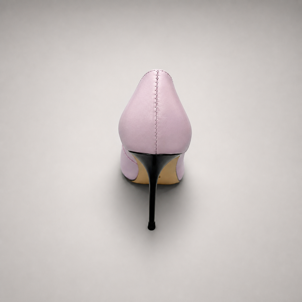 Pink pump rear view showing a pointed toe
