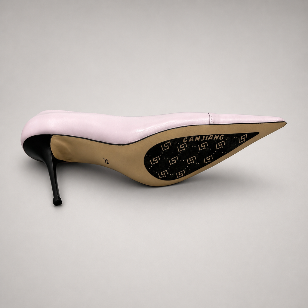 Pink pump outsole view showing the cow leather outsole