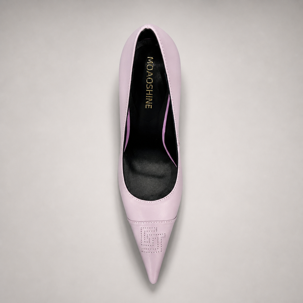 Pink pump top view showing a pointed toe