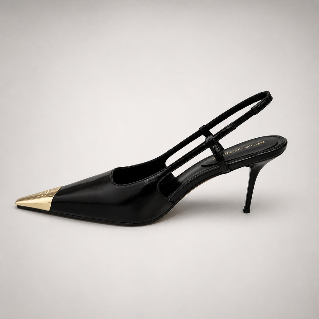 Black slingback pump opposite side profile showing a pointed toe, slingback strap, and metal toe cap
