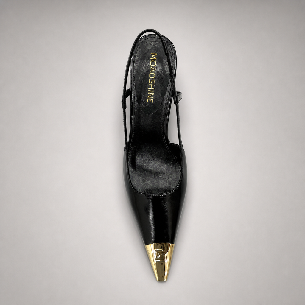 Black slingback pump outsole view showing the cow leather outsole