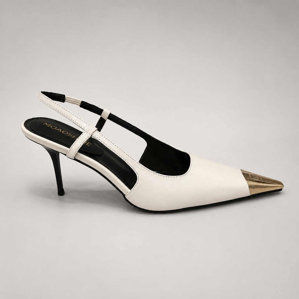 White slingback pump side profile showing a pointed toe, slingback strap, and metal toe cap