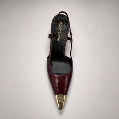 Burgundy slingback pump outsole view showing the cow leather outsole