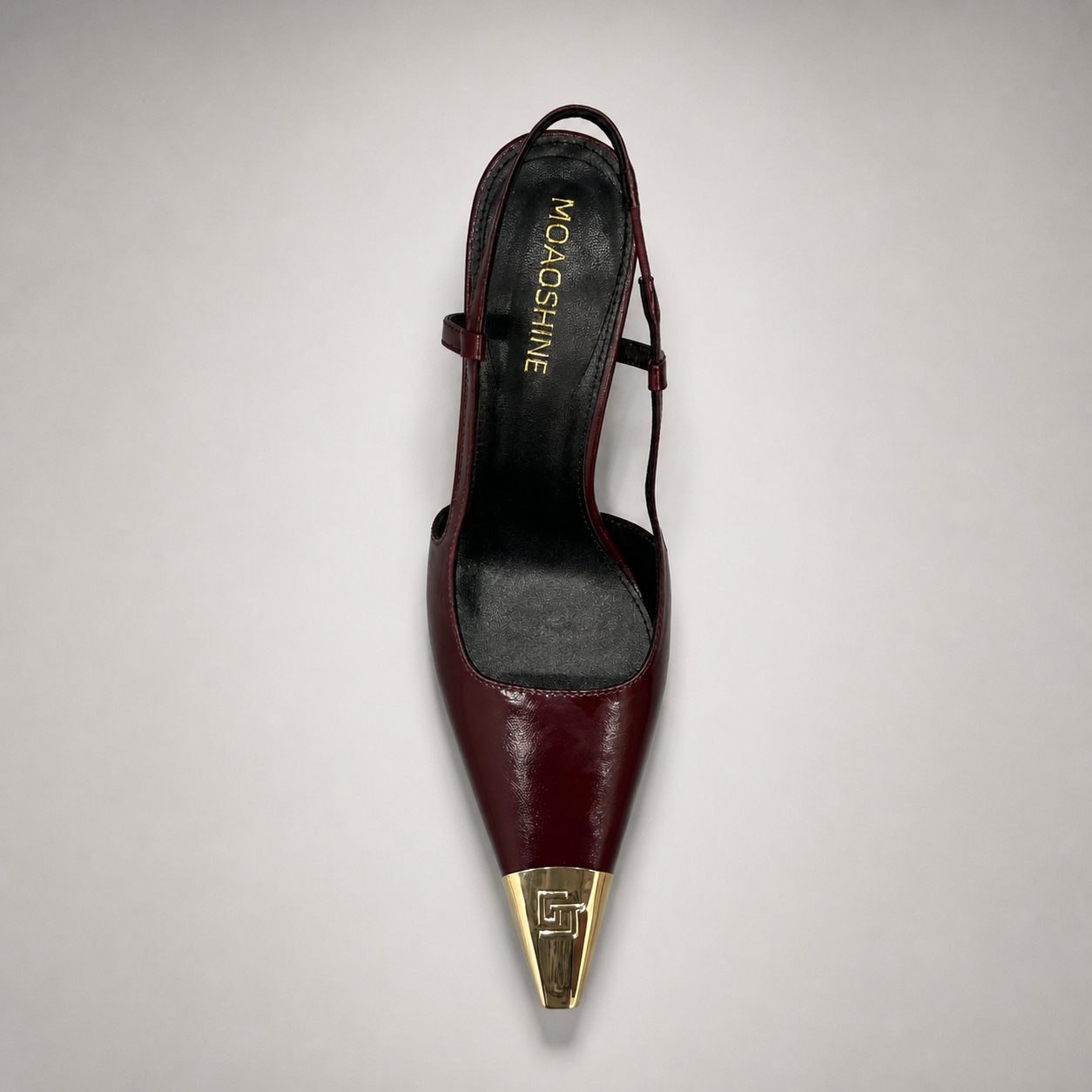 Burgundy slingback pump outsole view showing the cow leather outsole
