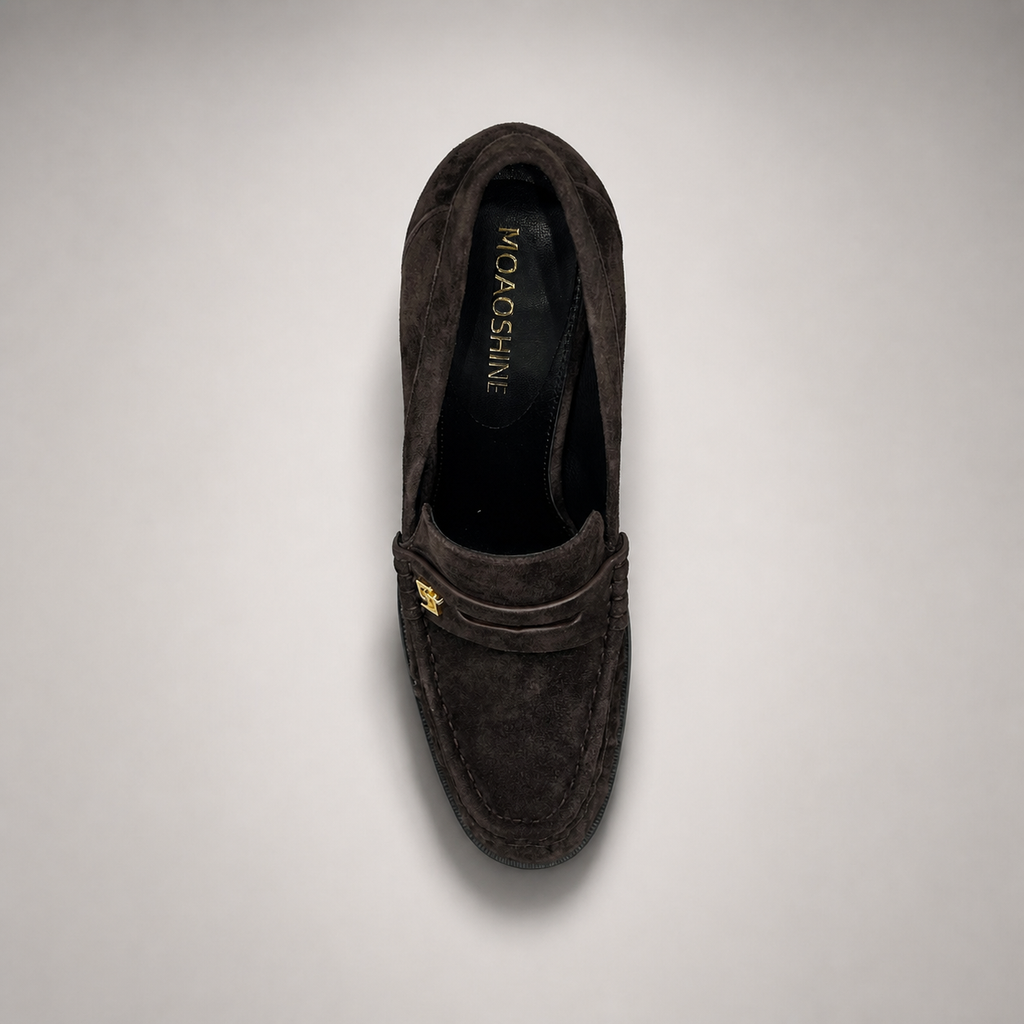 Dark Brown high-heeled loafer rear view showing a loafer-inspired vamp and block heel
