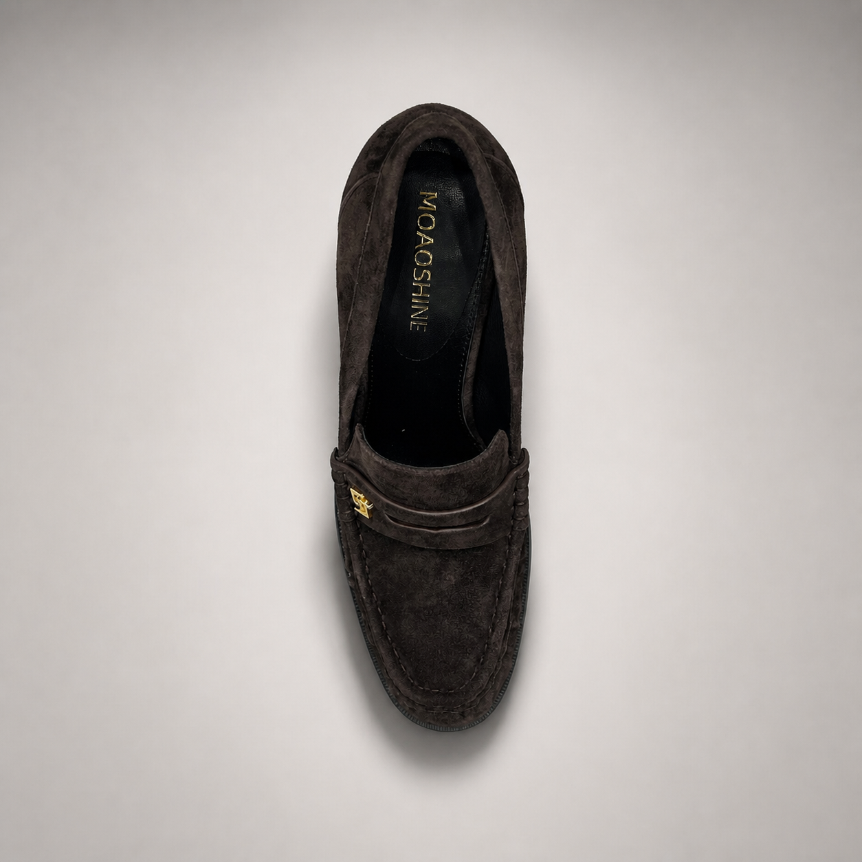 Dark Brown high-heeled loafer rear view showing a loafer-inspired vamp and block heel