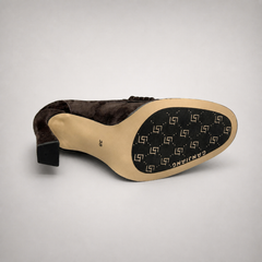 Dark Brown high-heeled loafer top view showing a loafer-inspired vamp and block heel