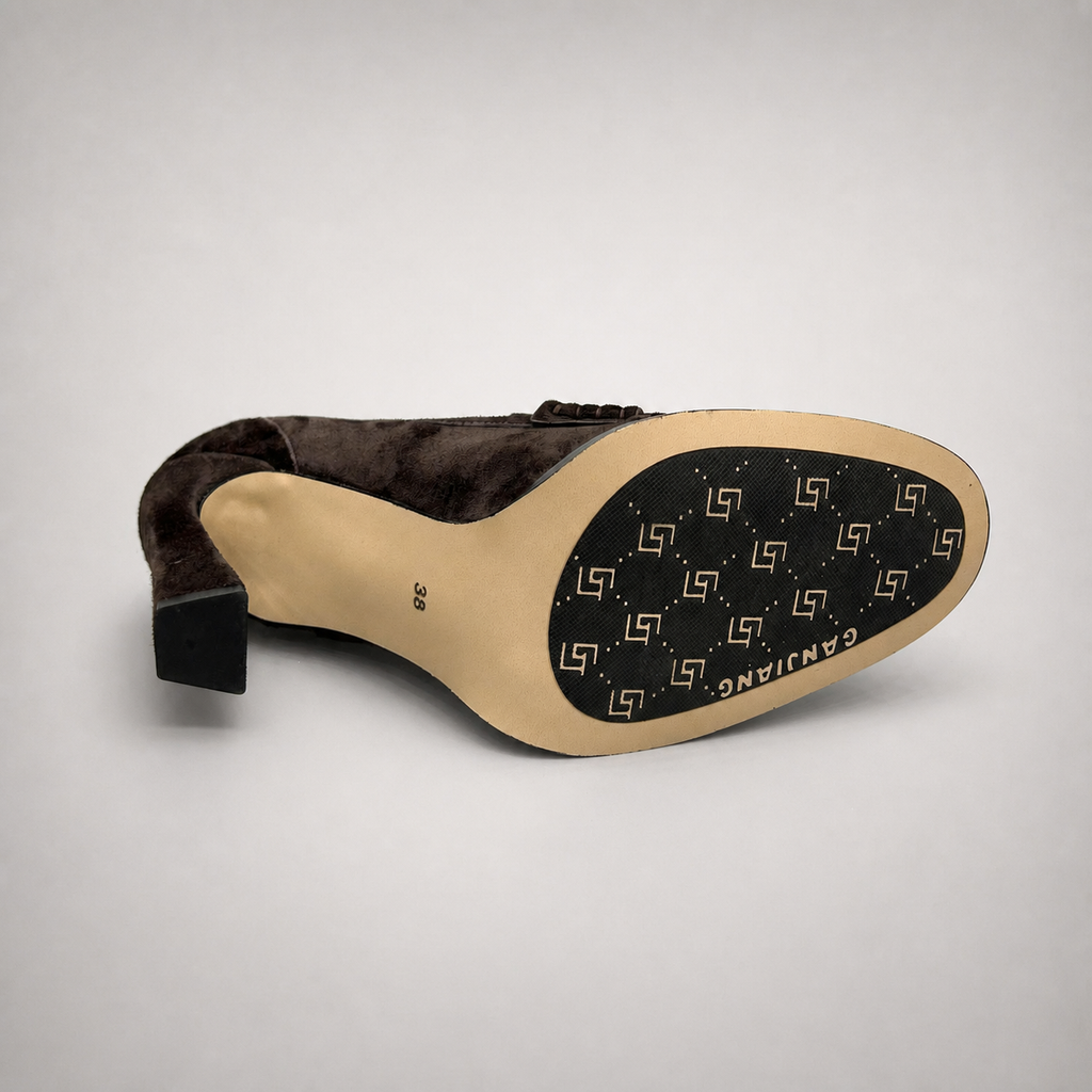Dark Brown high-heeled loafer top view showing a loafer-inspired vamp and block heel