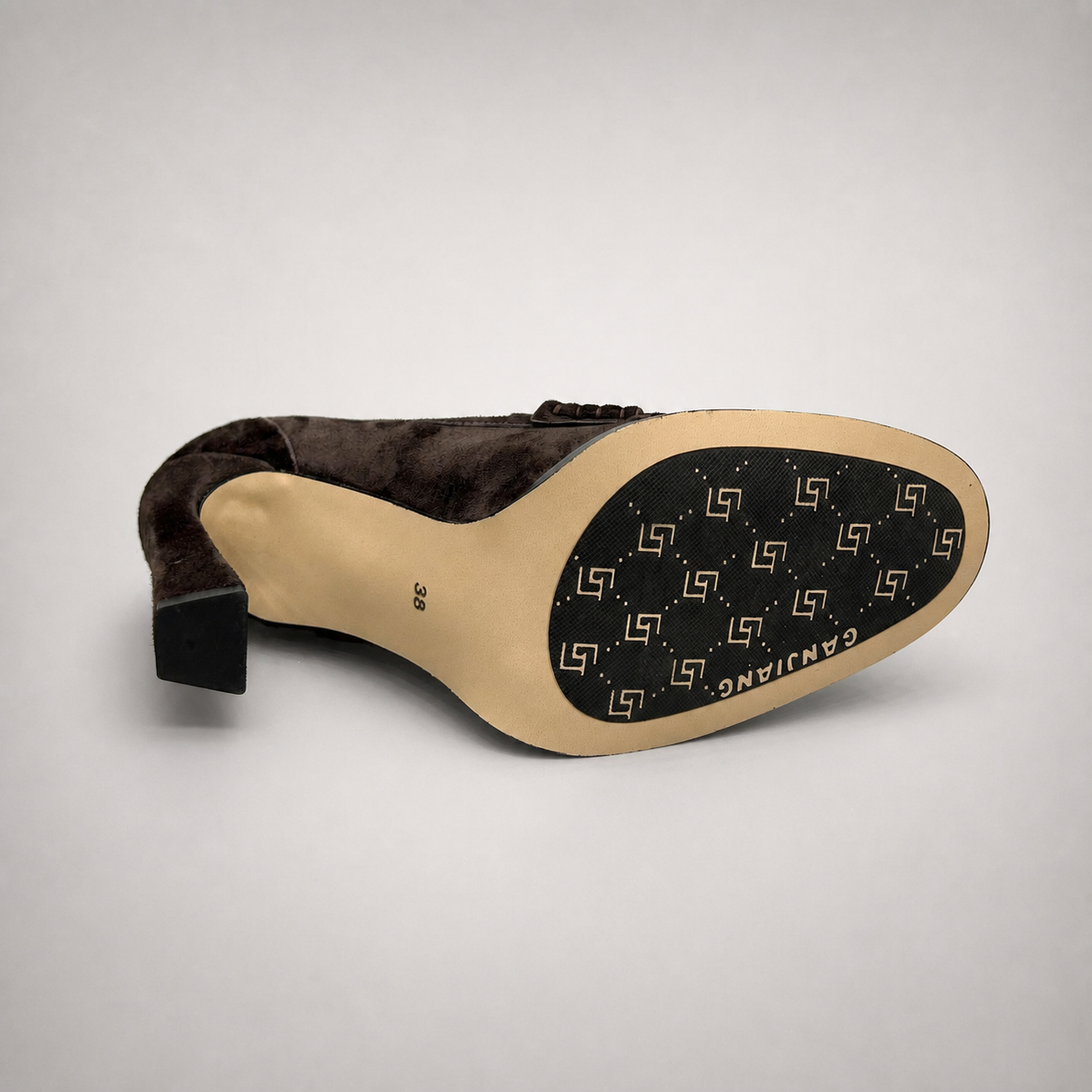 Dark Brown high-heeled loafer top view showing a loafer-inspired vamp and block heel