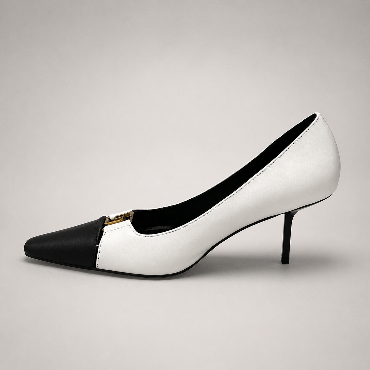 White pump opposite side profile showing a square toe, slingback strap, and metal accent