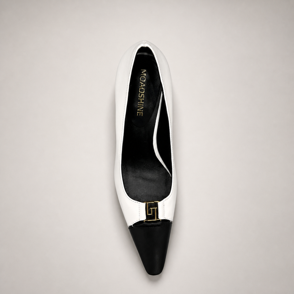 White pump top view showing a square toe, slingback strap, and metal accent