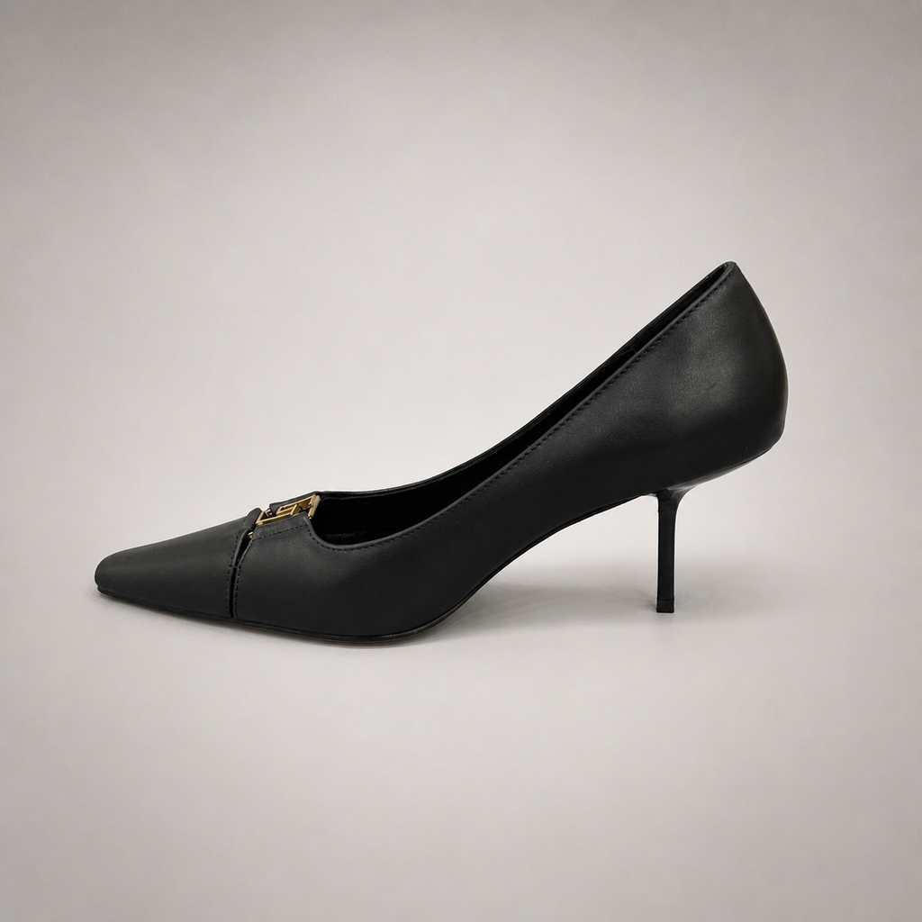 Black pump opposite side profile showing a square toe, slingback strap, and metal accent