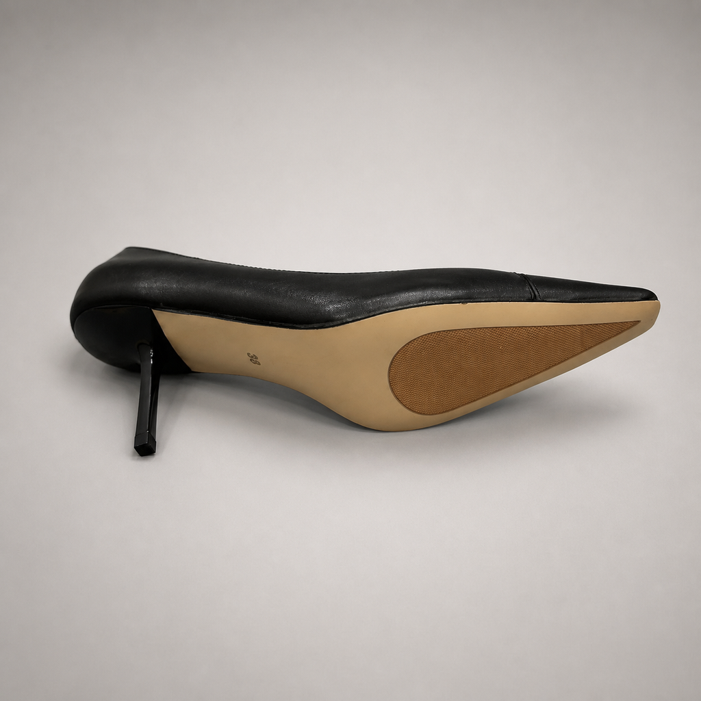 Black pump outsole view showing the cow leather outsole