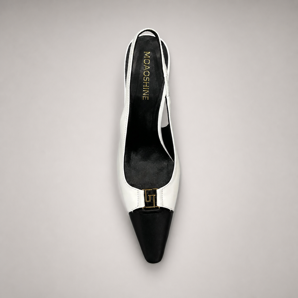 White slingback pump top view showing a square toe, slingback strap, and metal accent