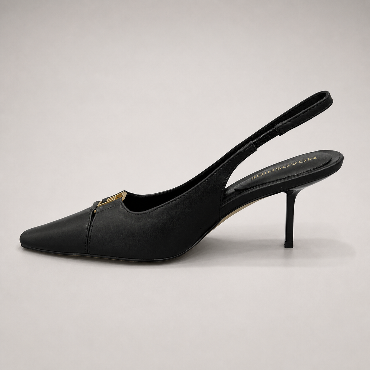 Black slingback pump opposite side profile showing a square toe, slingback strap, and metal accent