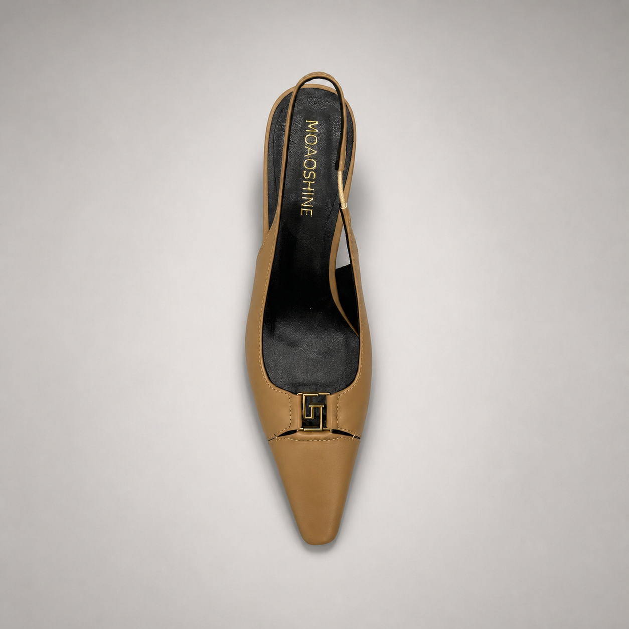 Tan slingback pump top view showing a square toe, slingback strap, and metal accent