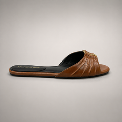 Brown slide sandal side profile showing a braided forefoot strap