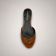 Brown slide sandal outsole view showing the cow leather outsole
