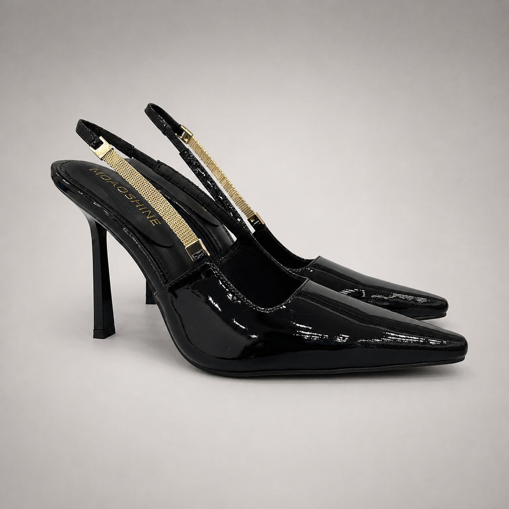 Black slingback pump pair three-quarter view showing a pointed toe