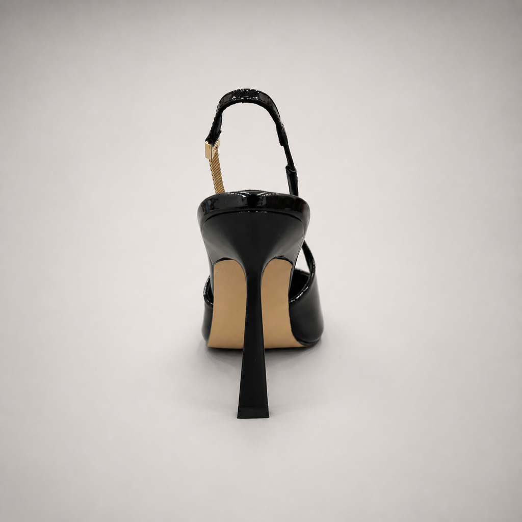 Black slingback pump top view showing a pointed toe