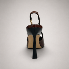 Brown slingback pump rear view showing a pointed toe