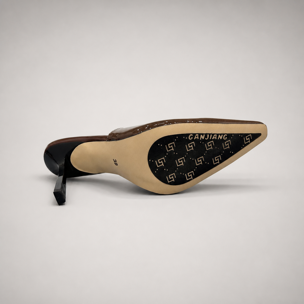 Brown slingback pump top view showing a pointed toe