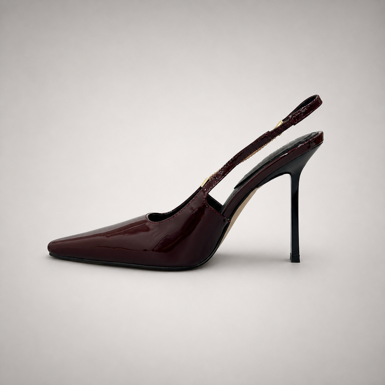 Burgundy slingback pump opposite side profile showing a pointed toe
