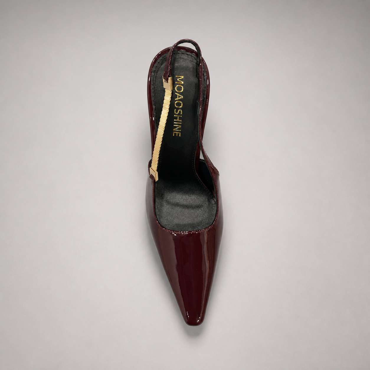 Burgundy slingback pump top view showing a pointed toe