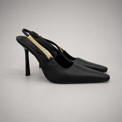 Black slingback pump pair three-quarter view showing a pointed toe