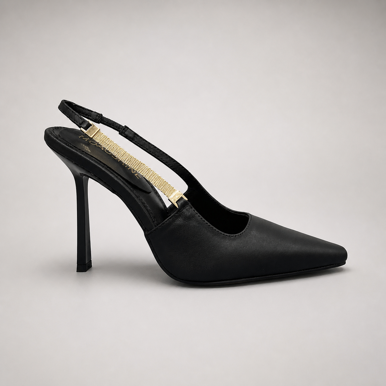 Black slingback pump side profile showing a pointed toe