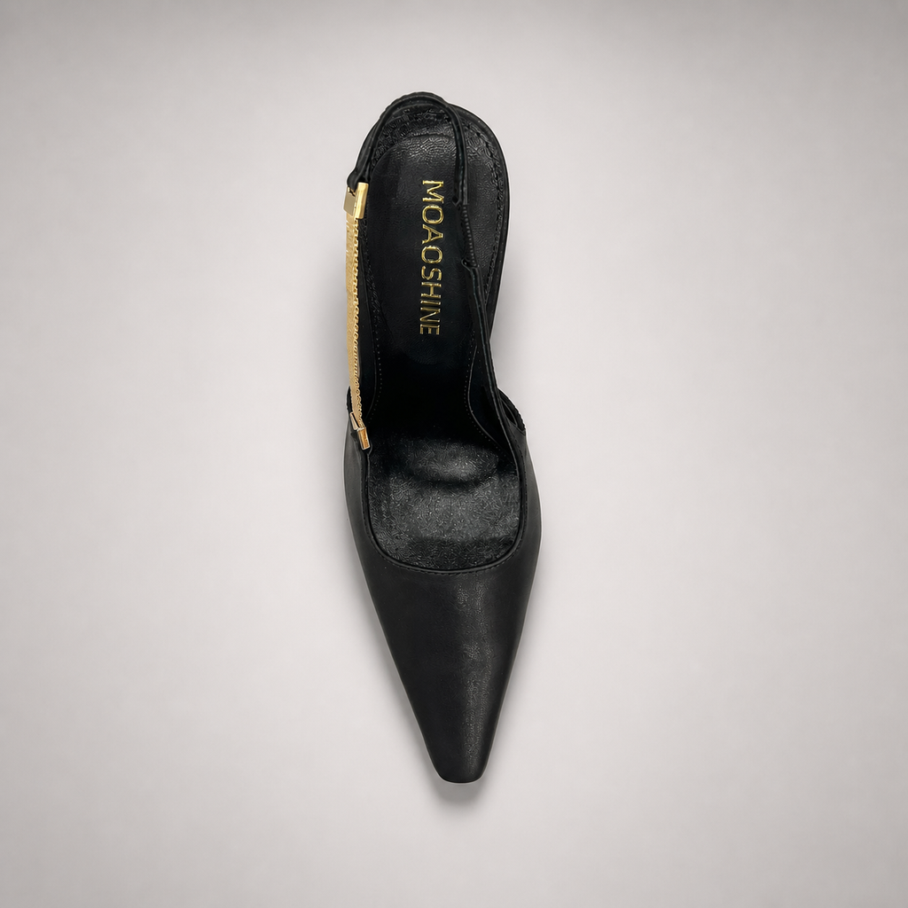 Black slingback pump outsole view showing the cow leather outsole