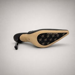 Black slingback pump top view showing a pointed toe