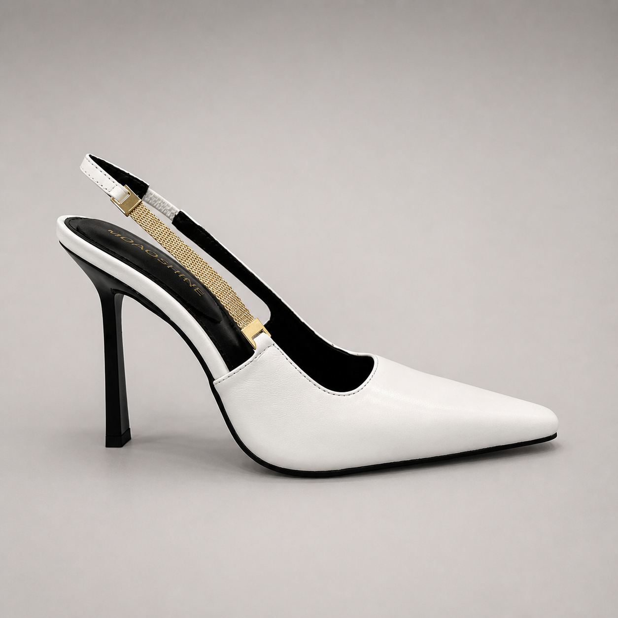 White slingback pump side profile showing a pointed toe and double slingback straps