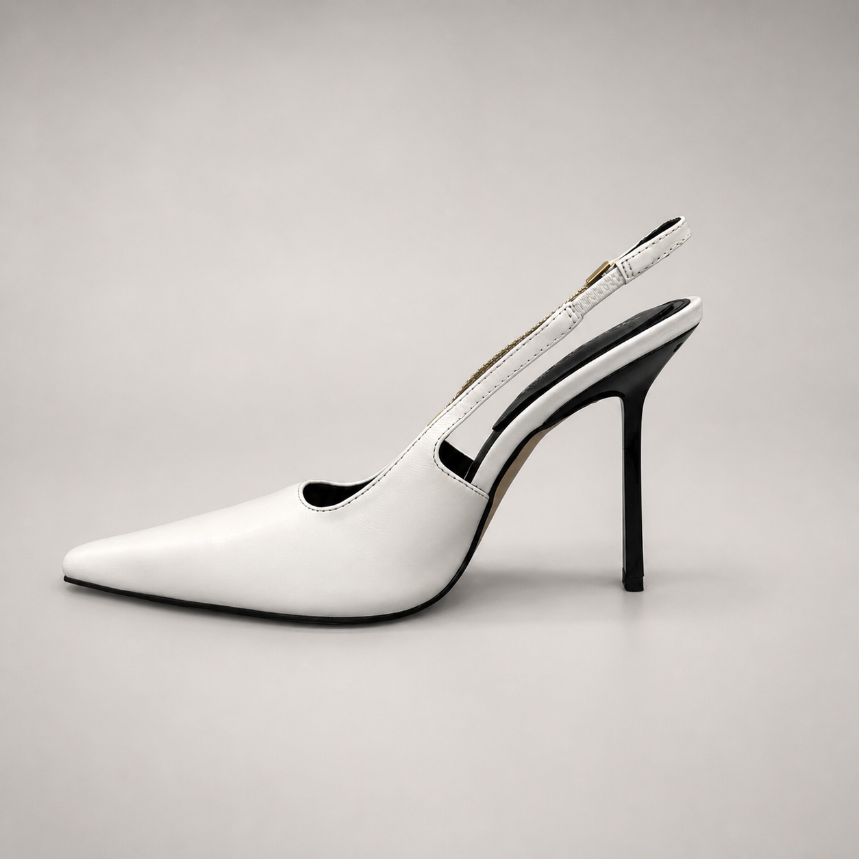 White slingback pump opposite side profile showing a pointed toe and double slingback straps