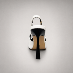 White slingback pump rear view showing a pointed toe and double slingback straps