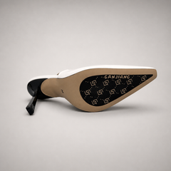 White slingback pump outsole view showing the cow leather outsole