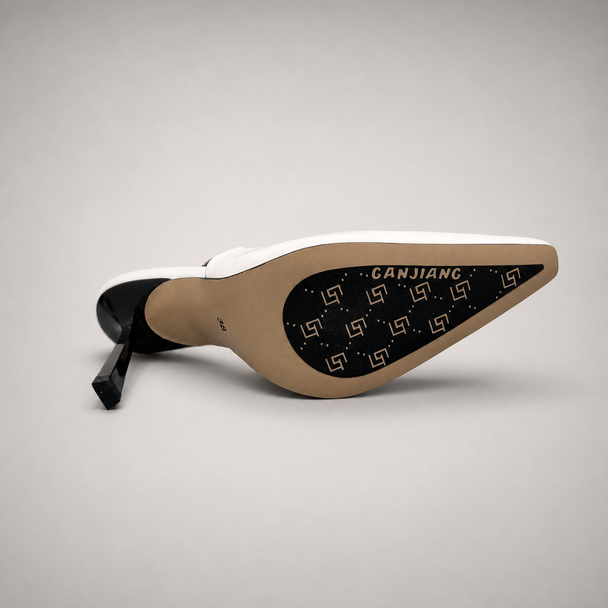 White slingback pump outsole view showing the cow leather outsole