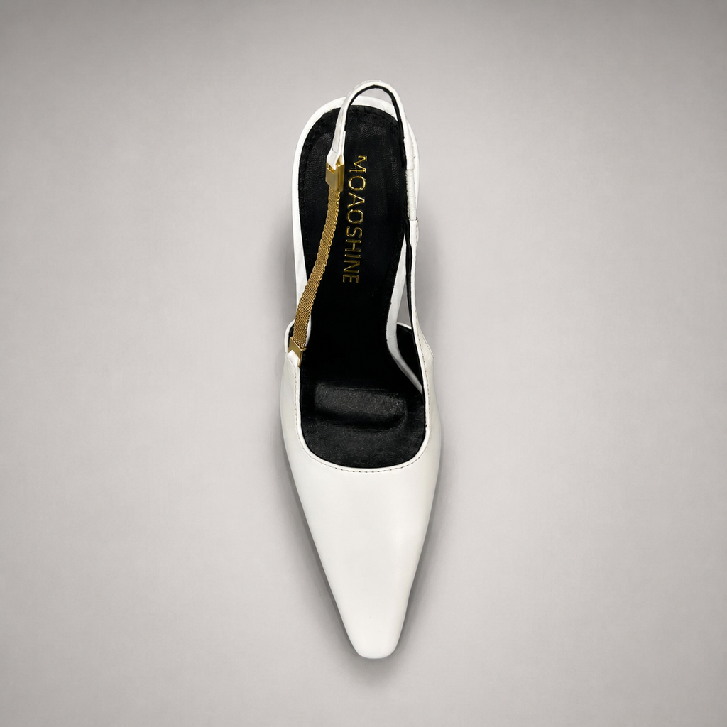 White slingback pump top view showing a pointed toe and double slingback straps