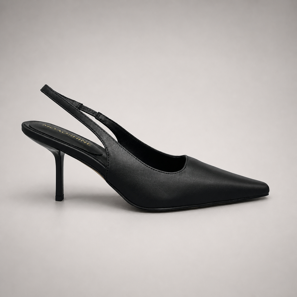 Black slingback pump side profile showing a pointed toe