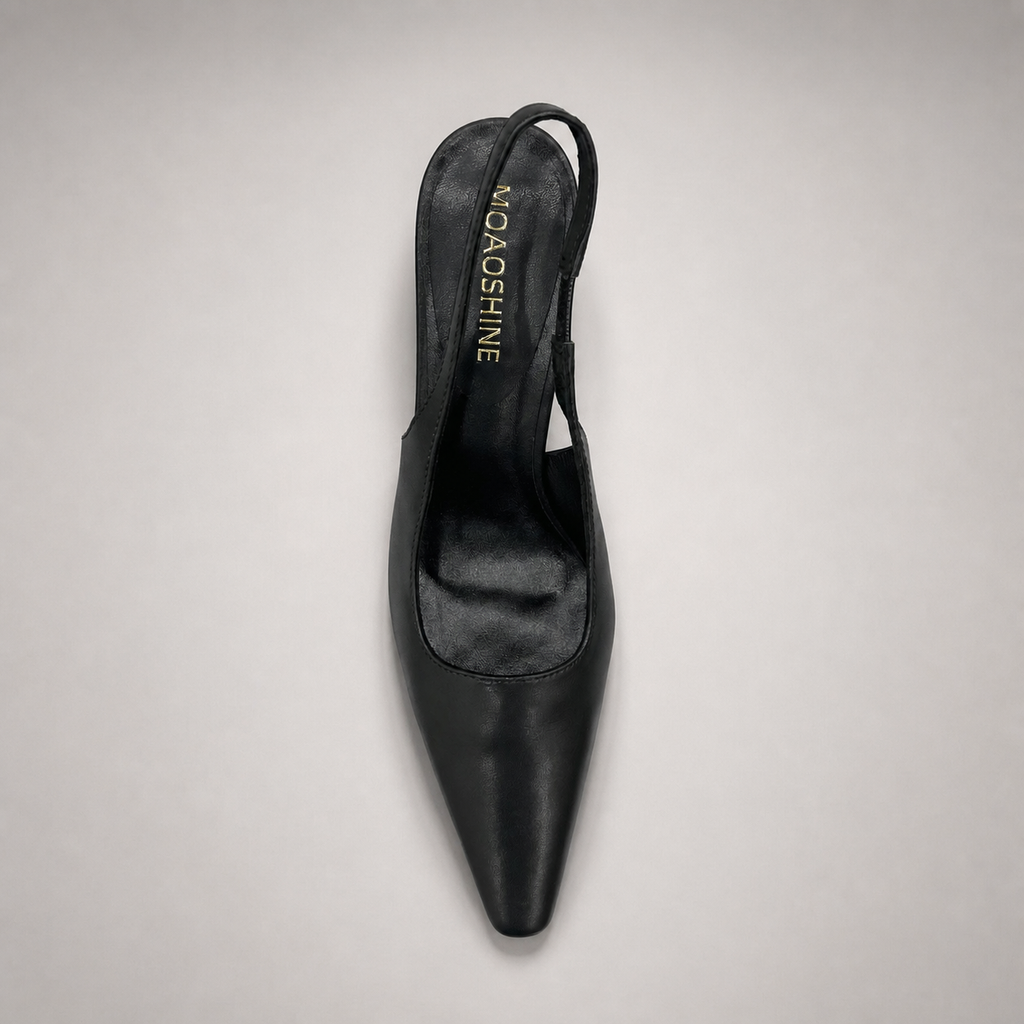 Black slingback pump top view showing a pointed toe