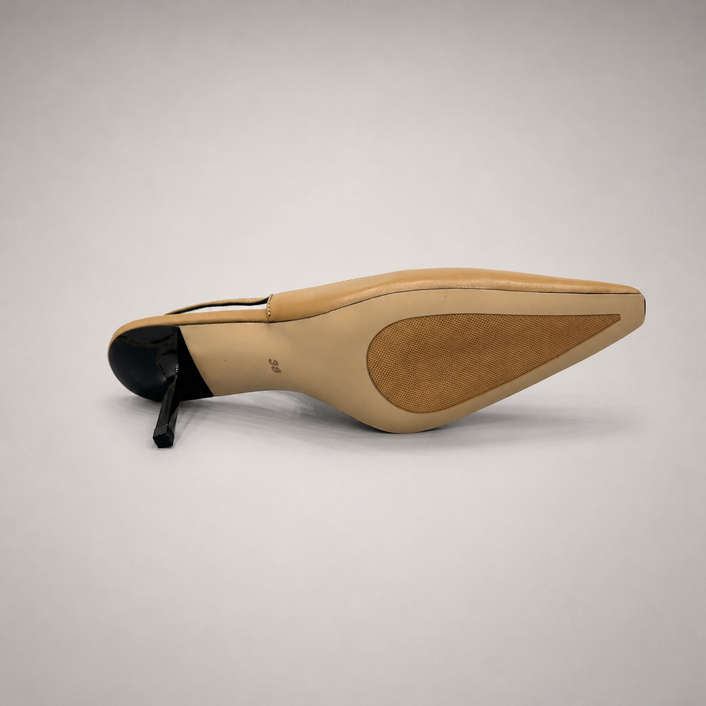 Tan slingback pump outsole view showing the cow leather outsole