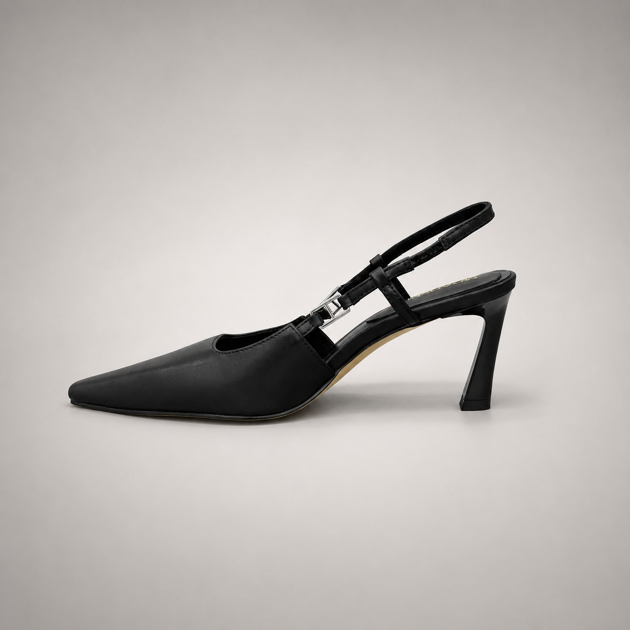 Black slingback pump opposite side profile showing a pointed toe and double slingback straps
