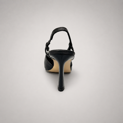 Black slingback pump rear view showing a pointed toe and double slingback straps