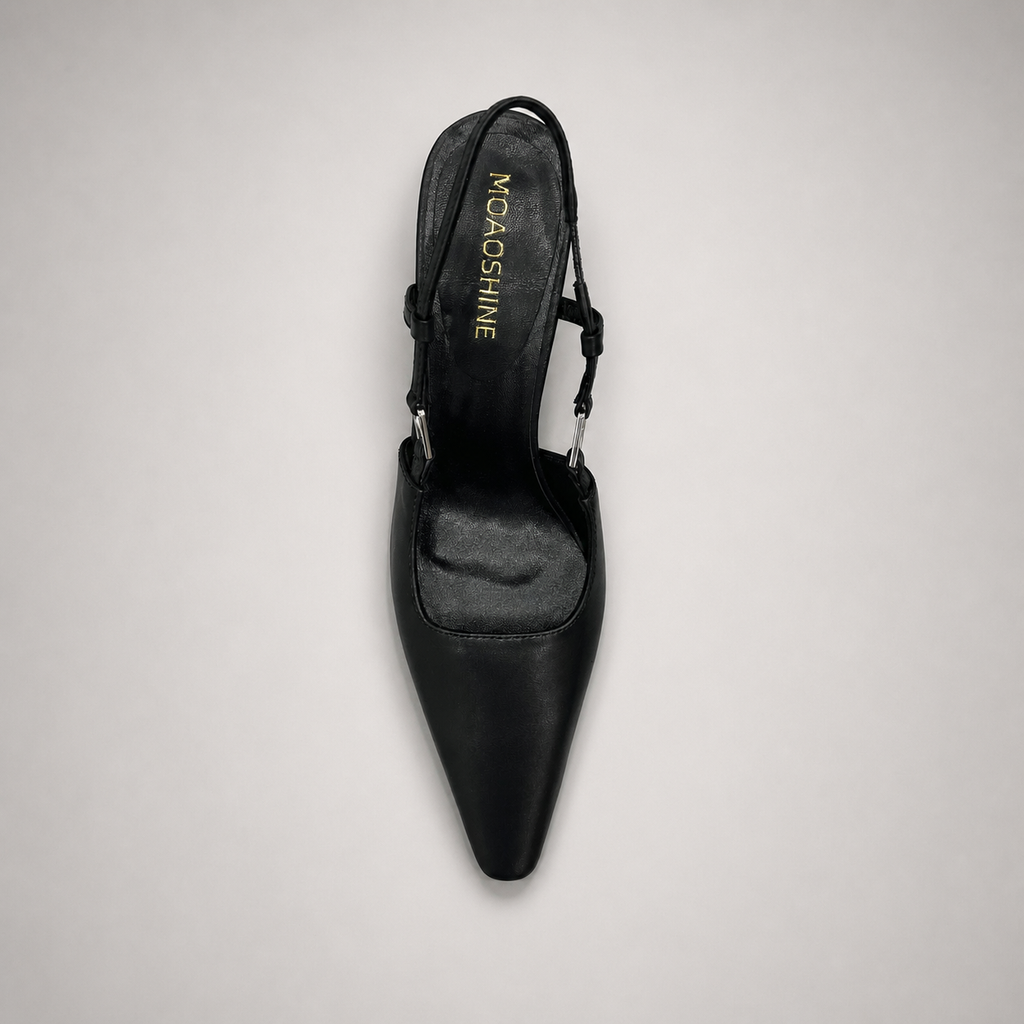 Black slingback pump top view showing a pointed toe and double slingback straps