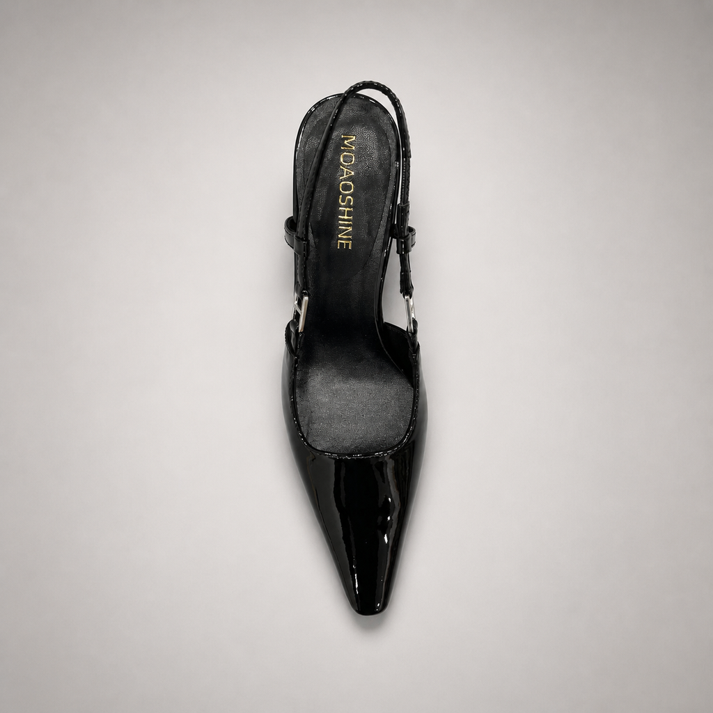 Black slingback pump top view showing a pointed toe and double slingback straps