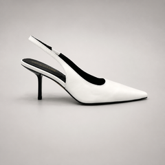 White slingback pump side profile showing a pointed toe, angular side cutout, and slingback strap
