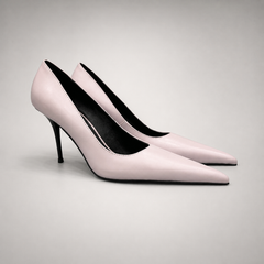 Pink pump pair three-quarter view showing a pointed toe